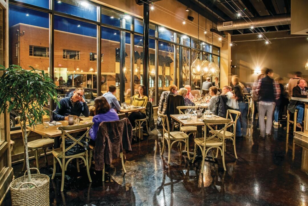 Interior shot of the dining room inside Quanto Basta 