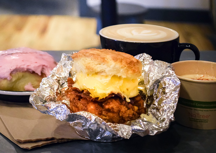 A chicken biscuit, coffee, and cinnamon roll at Krankie's Coffee in Winston-Salem.