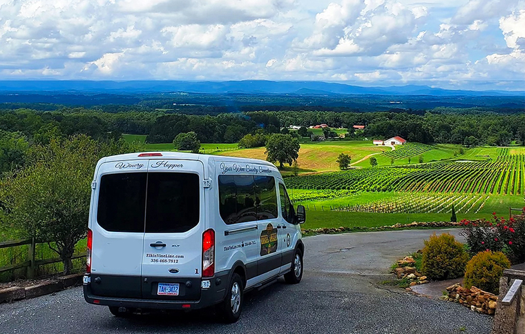 A shuttle travels through Yadkin Valley Wine Country