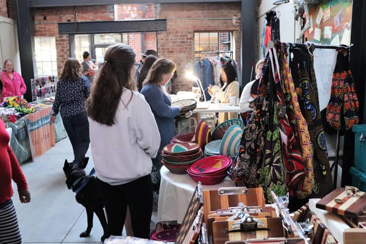 Holiday shoppers explore the Winston Junction Holiday Market in Winston-Salem, North Carolina