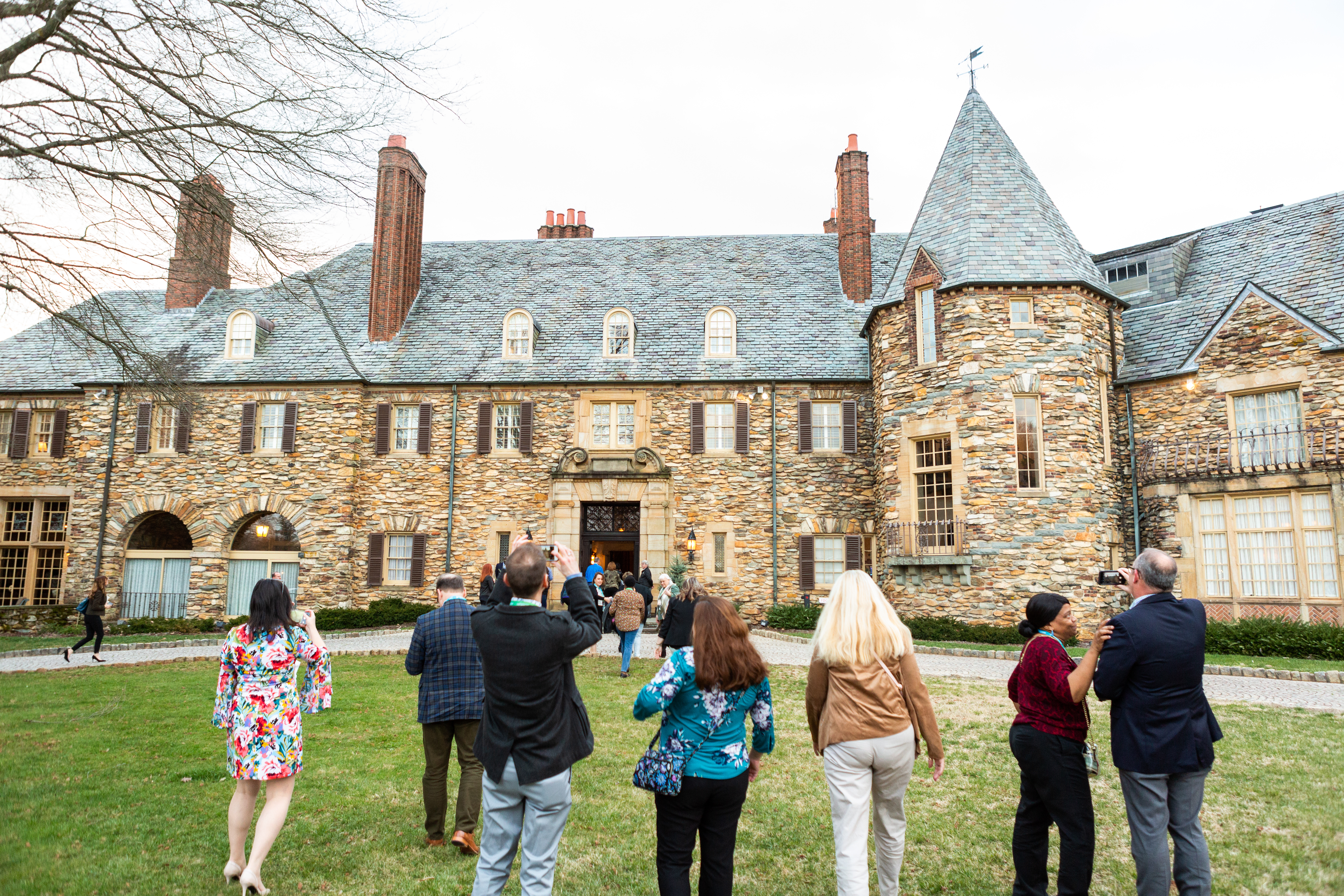 A group tour approaches the Graylyn Estate Hotel and Conference Center in Winston-Salem.