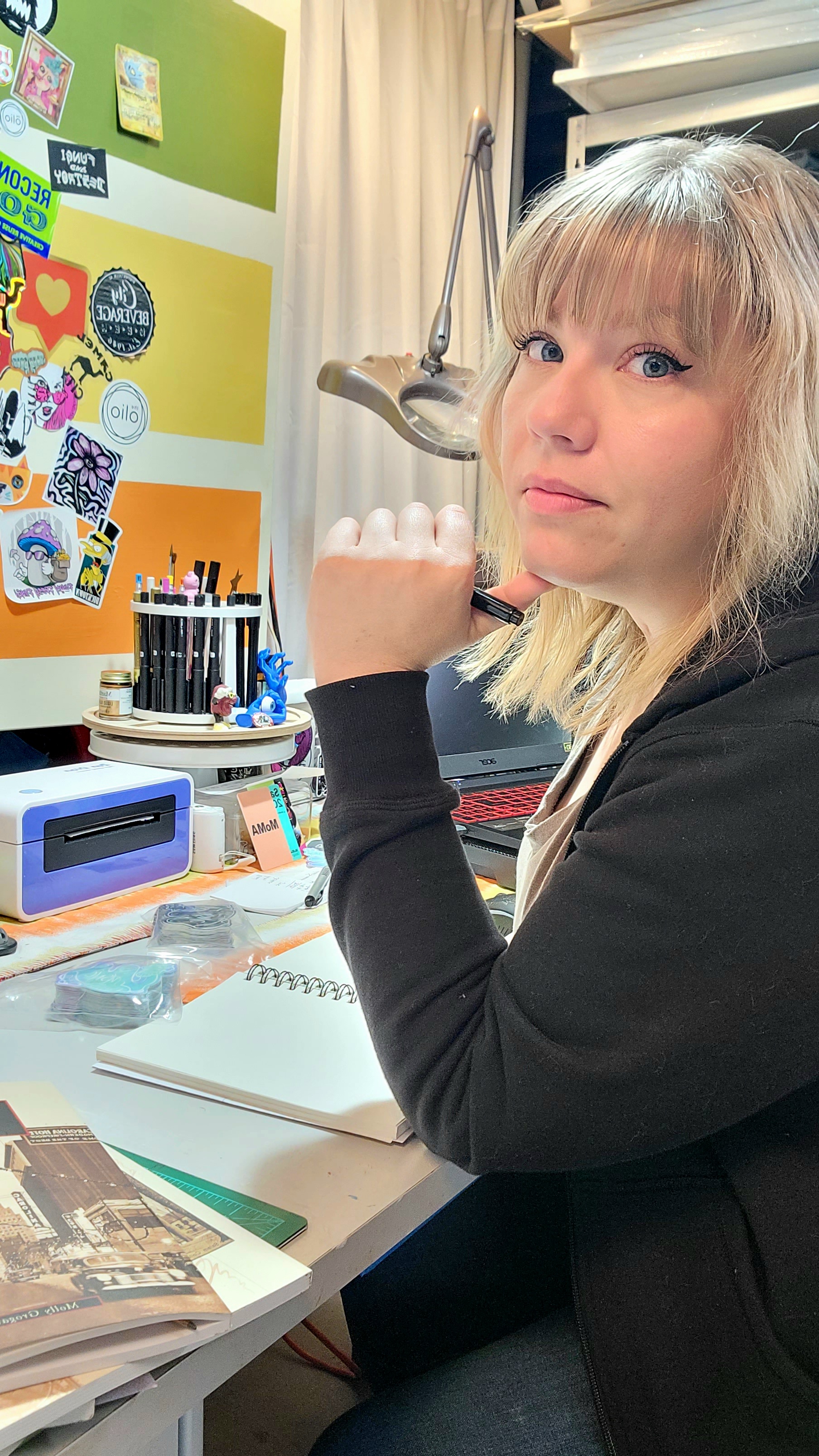 Vikki Vassar, Winston-Salem based local artist, at her drawing table.
