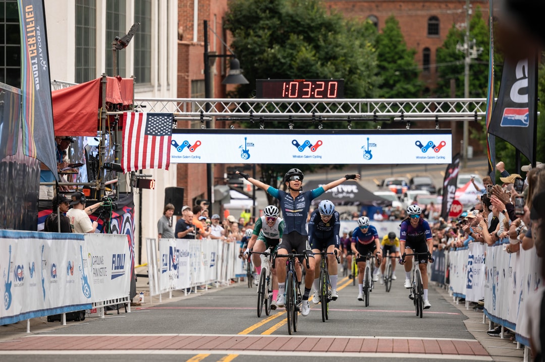 Cyclists cross the finish line at the Winston-Salem Cycling Classic.