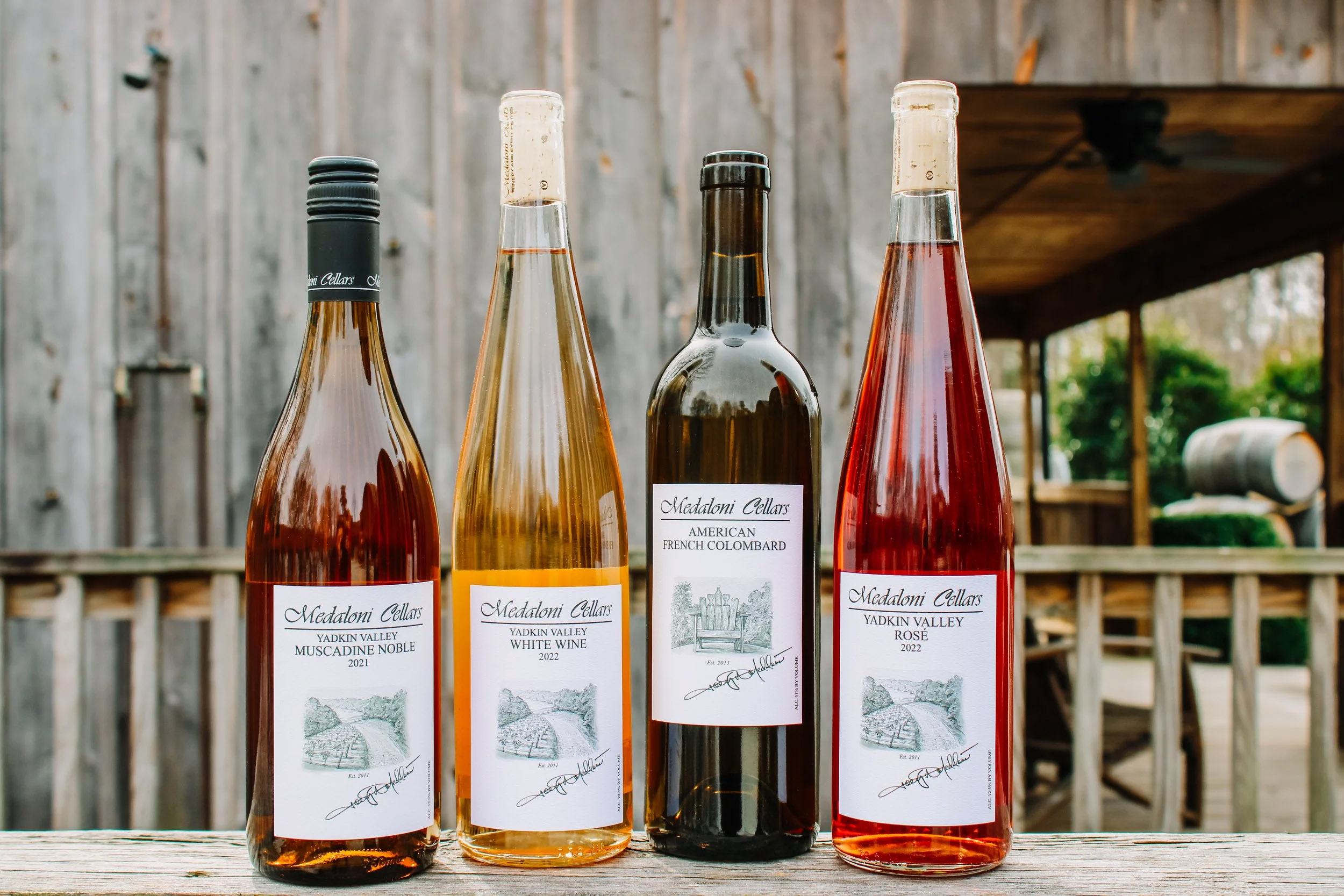 Medaloni Cellars wine bottles on the patio
