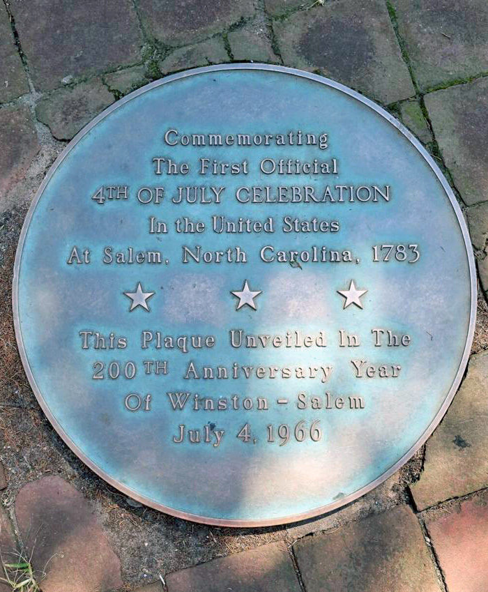 A plaque in Salem Square marks the site of the first documented July 4th celebration in America