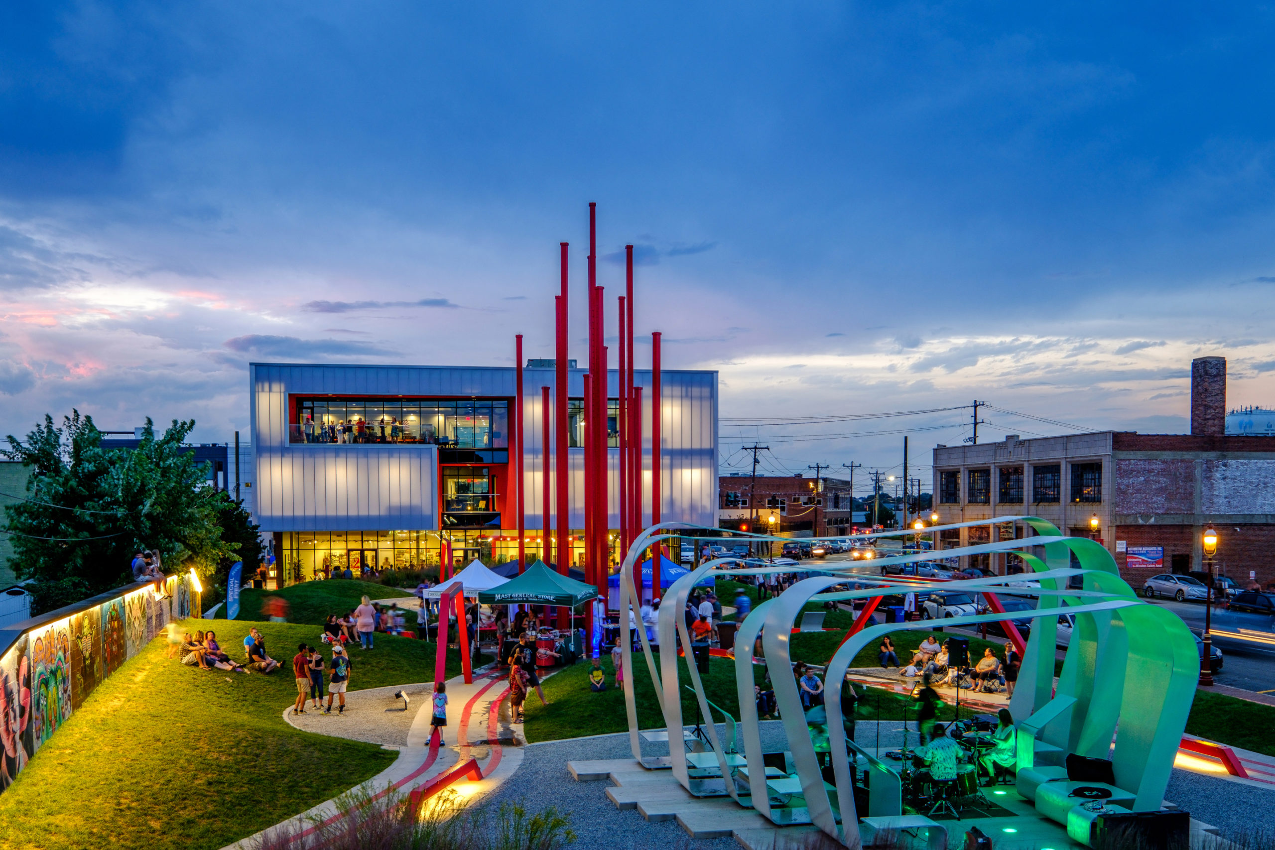 Artivity Park in Winston-Salem's downtown arts district, at night during an event.