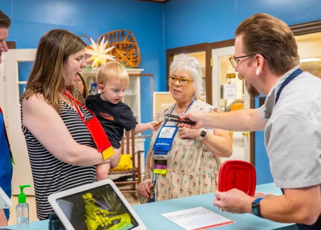 Kay Calzolari, Senior Group Sales & Services Manager at Visit Winston-Salem, attends a group tour at Mrs. Hanes Moravian Cookie Factory.
