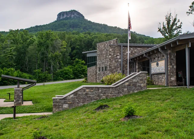 The Visitor Center at Pilot Mountain State Park, with a view of the Big Pinnacle in the background.