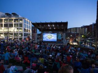 An outdoor movie screening in Bailey Park, located in downtown Winston-Salem.