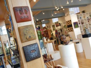 A interior shot of the Piedmont Craftsmen Gallery, displaying the world of arts from around the country, located in Winston-Salem's downtown arts district.