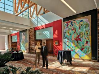 Two meeting planners having a discussion at the Benton Convention Center in Winston-Salem, North Carolina