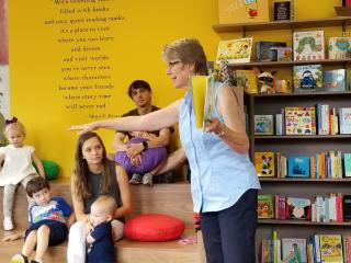 A woman leads a children's book reading event at Bookmarks, an independent bookstore in downtown Winston-Salem.