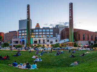 A panoramic drone photo of Bailey Park and the Bailey Power Plant in downtown Winston-Salem's Innovation Quarter neighborhood.