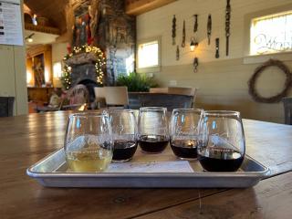 A wine tasting flight pictured on a table at the Grassy Creek Vineyard tasting room near Winston-Salem.