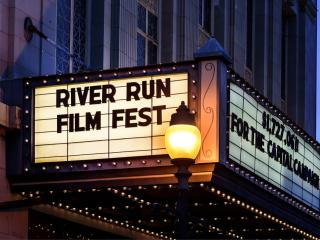 A movie marquee displays the "Riverrun International Film Festival" ahead of a screening during the festival in Winston-Salem.