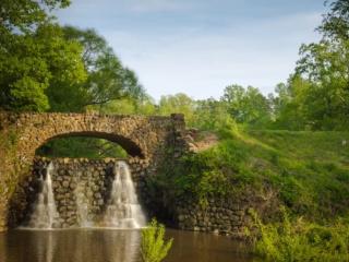A stone-facade waterfall at Reynolda Village in Winston-Salem.