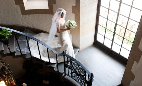 Bride coming down Stairs at Graylyn Estate