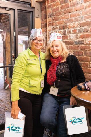 Ladies in Krispy Kreme hats