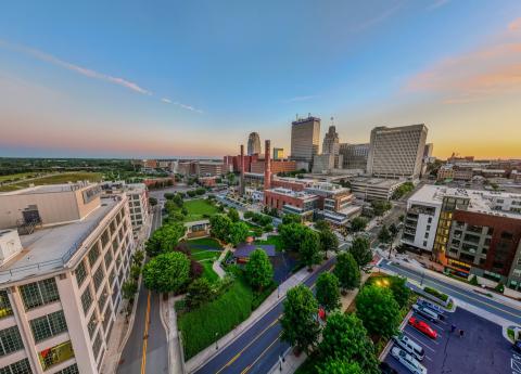 An aerial view of Bailey Park, the RJ Reynolds Smokestacks, and the Innovation Quarter neighborhood of downtown Winston-Salem.
