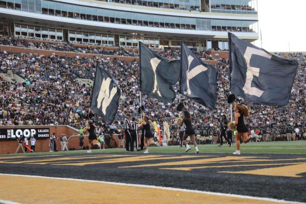 Wake Forest cheerleaders with flags