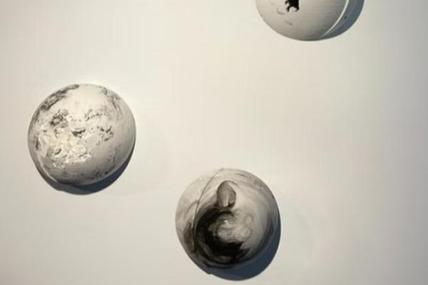 Orbscured and questions greater than answers exhibit Photo 3