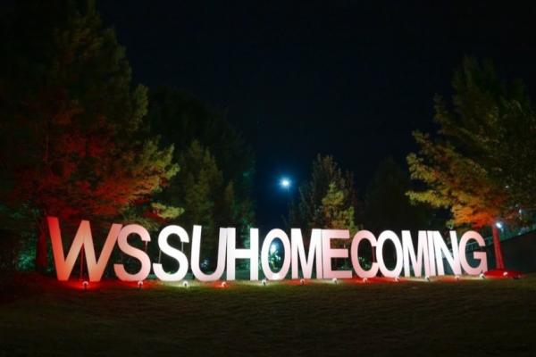 Lighting of the Sign Photo