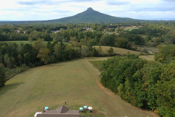 This aerial shot of the tasting room view captures the wonderful ambiance you can enjoy. Photo 14