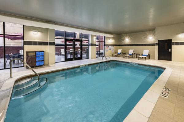 Take a refreshing dip in our indoor heated saltwater pool, connected to our outdoor lounge patio. Photo 26