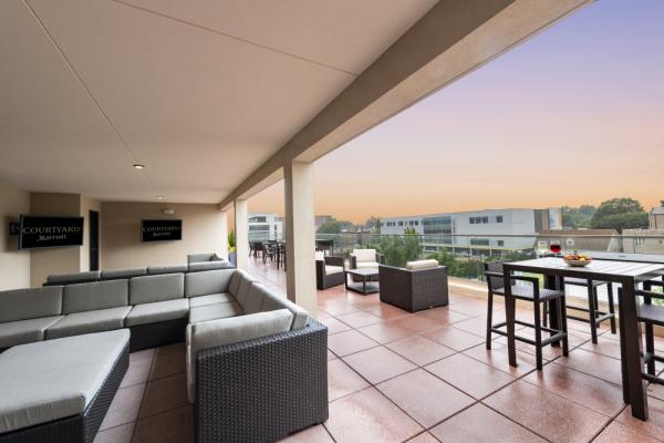 Winston-Salem's first hotel rooftop bar, complete with breathtaking views of city skyline. Photo 5