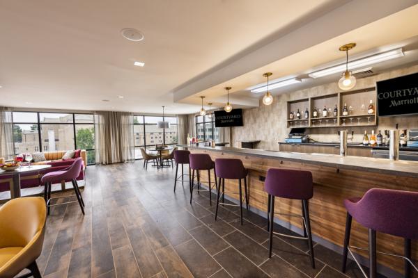 Winston-Salem's first hotel rooftop bar, complete with breathtaking views of city skyline. Photo 6