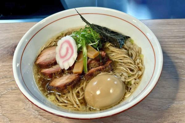 Noodle Ju’b (pronounced JOOB) is a neighborhood ramen counter serving thoughtfully made bowls inside Salem Bottleworks, the restored 1929 Coca-Cola Plant near Old Salem. Photo