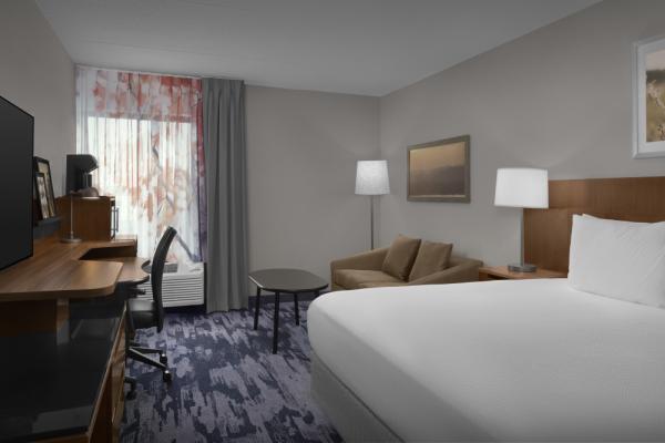 Spacious King Room with sleeper sofa at the Fairfield Inn & Suites Winston-Salem Hanes Mall, a pet friendly hotel located along I-40. Photo 2