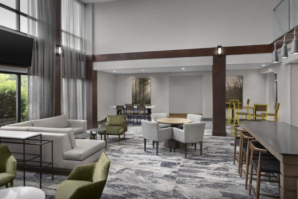 Enjoy gathering in the spacious lobby of our hotel in Winston-Salem near Novant Health. Photo 5