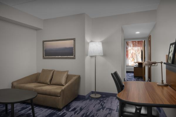 Book a spacious suite with seperate living area the next time you need a hotel in Winston-Salem, NC! Photo 8