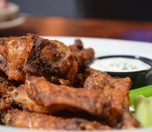 A plate of famous wings with ranch dressing at Foothills Brewpub in downtown Winston-Salem.