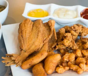 A seafood plate with fried flounder, shrimp, and hushpuppies at Forsyth Seafood in Winston-Salem, North Carolina