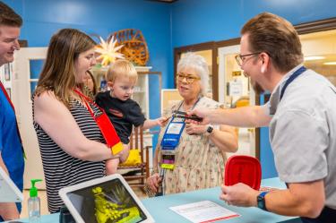 Kay Calzolari, Senior Group Sales &amp; Services Manager at Visit Winston-Salem, attends a group tour at Mrs. Hanes Moravian Cookie Factory.