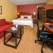 King bed with Sleeper Sofa. Complimentary Wifi. Two phones. Refrigerator. Work Desk. Photo 2