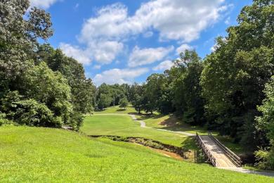 A wide shot of the fairway at Winston Lake Golf Course.