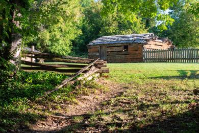 A historic building just off a trail at Historic Bethabara Park in Winston-Salem, North Carolina.