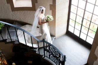 Bride coming down Stairs at Graylyn Estate