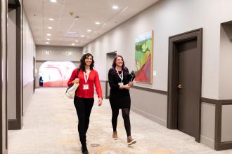 Women walking in Benton Convention Center