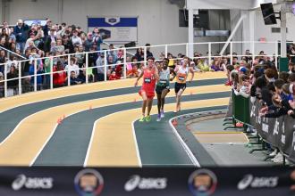 Runners turn a corner on the track at JDL FastTrack in Winston-Salem, North Carolina.