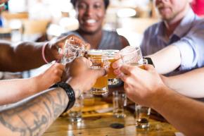 Group Cheers Fiddlin Fish Brewery