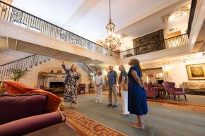 A tour group stops to admire the great room at the Reynolda House Museum of American Art.