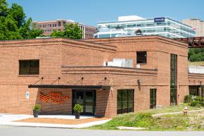 Exterior of MUSE Winston-Salem, as seen from the strollway trail.